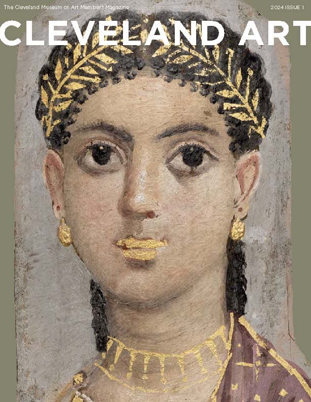 Magazine cover featuring a portrait of a woman wearing a gold wreath earrings and necklace painted on wood