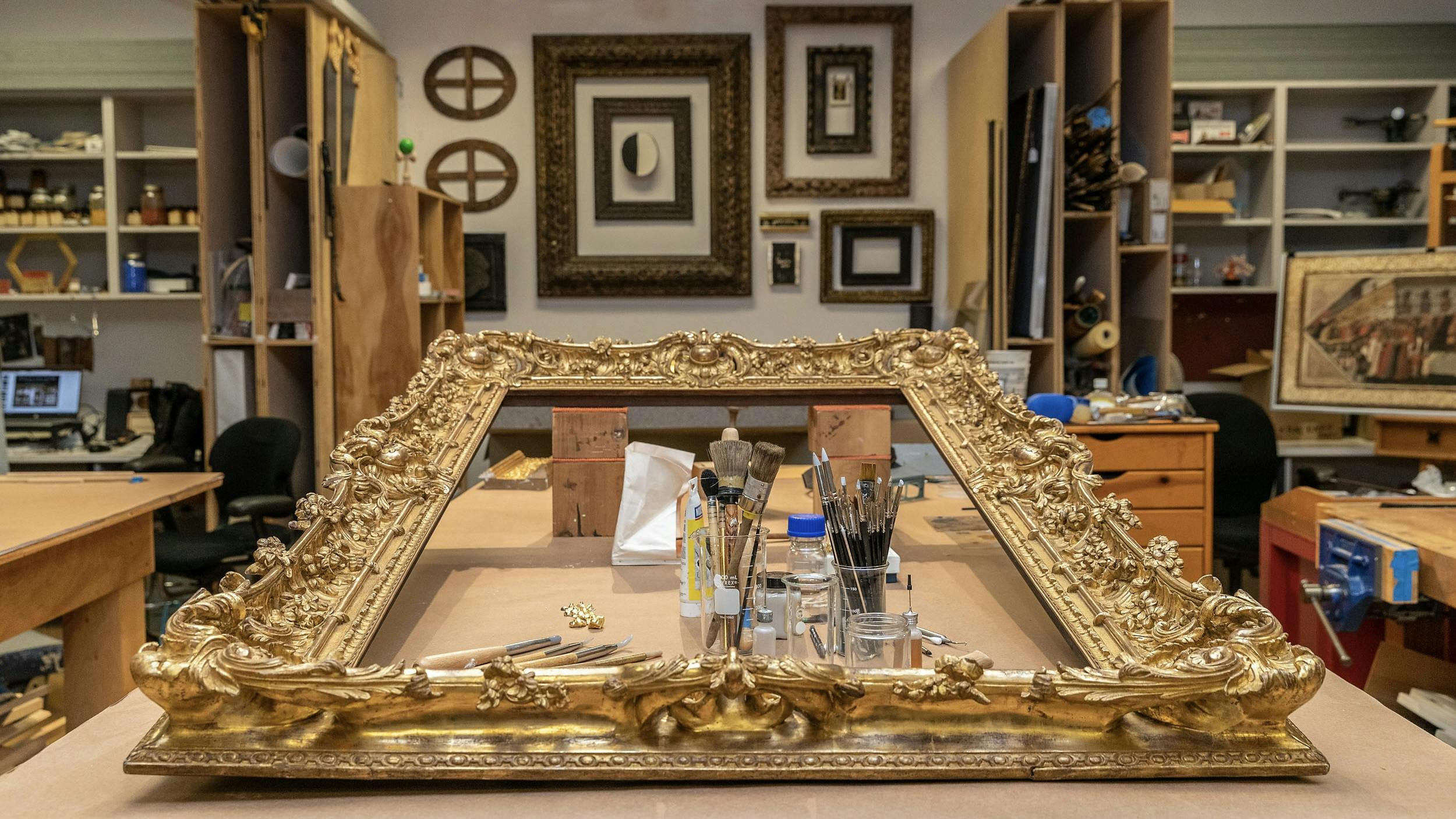 Gilded frame undergoing treatment in the frames lab