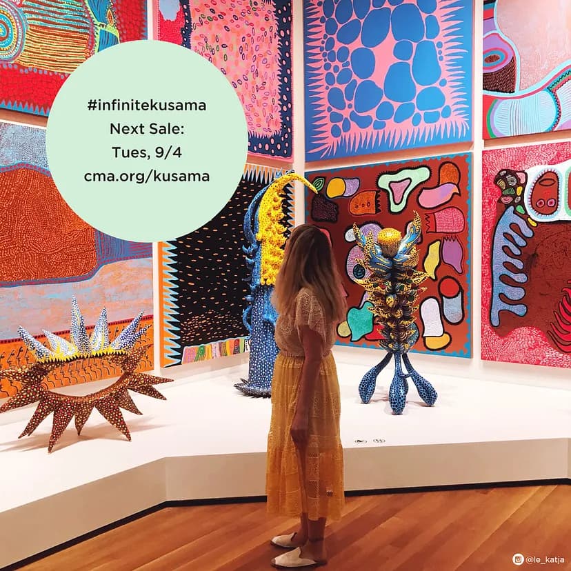 Person looking up at wall of squares with colorful patterns and spiny sculptures in front. "#inifinitekusama Next Sale: Tues, 9/4 cma.org/kusama"