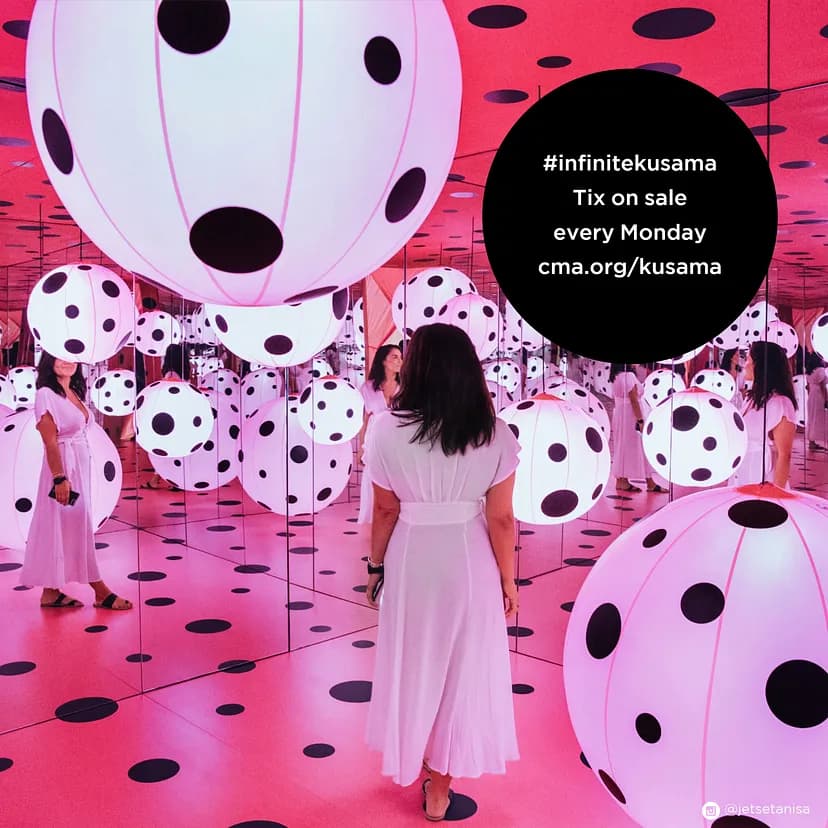 Person walking through room with white orbs and a pink floor and ceiling, all with black polka-dots. #infinitekusama Tix on sale every Monday cma.org/kusama"