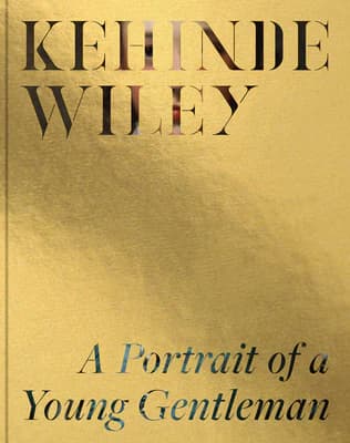 A gold book with the title "A Portrait of a Young Gentleman" and the authors name, "Kehinde Wiley" printed on the cover.