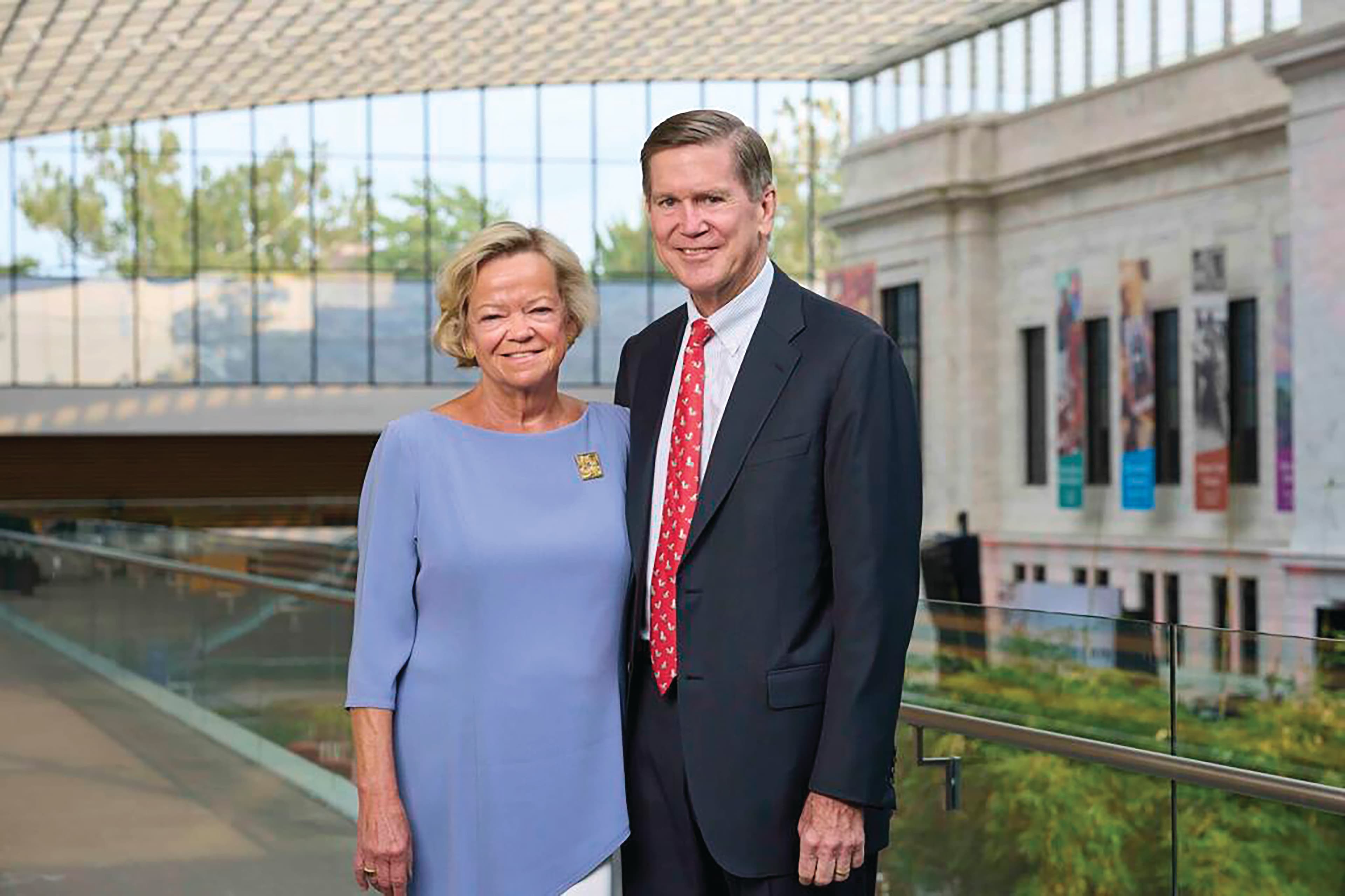 Couple smiling in museum