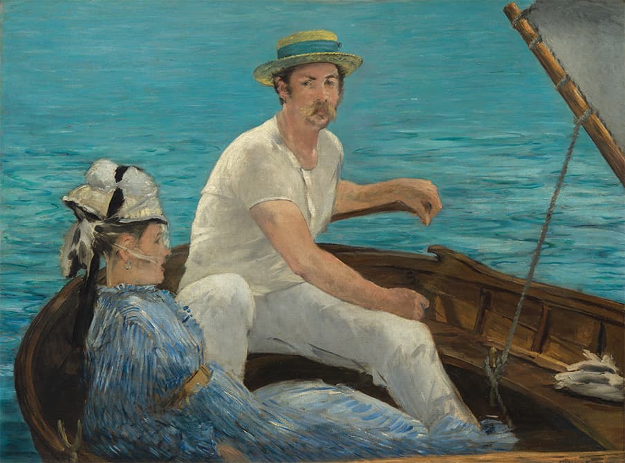 man and woman in a boat on water
