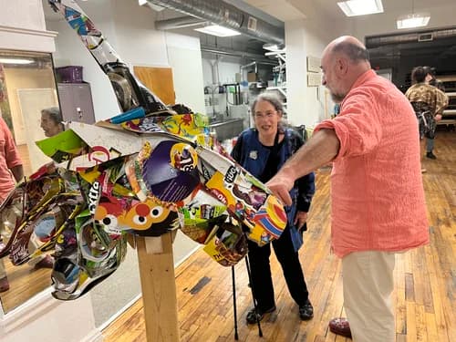 Artist with upcycled mask