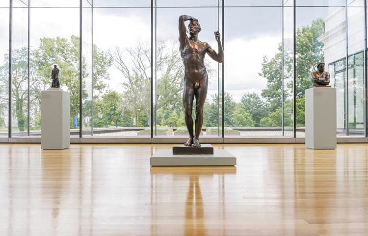 Natural Backdrop The initial installation of the east wing glass box in 2008 featured Rodin sculptures, including The Age of Bronze. The exhibition Rodin—100 Years again takes advantage of this beautiful view.