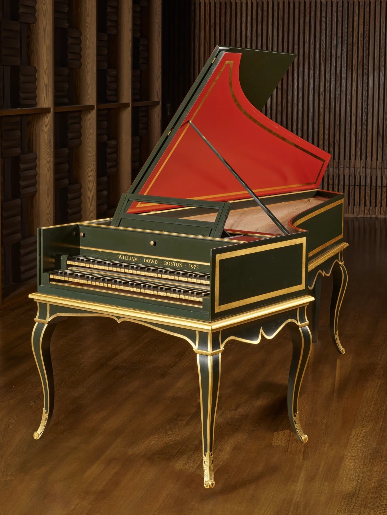 a green and gold piano