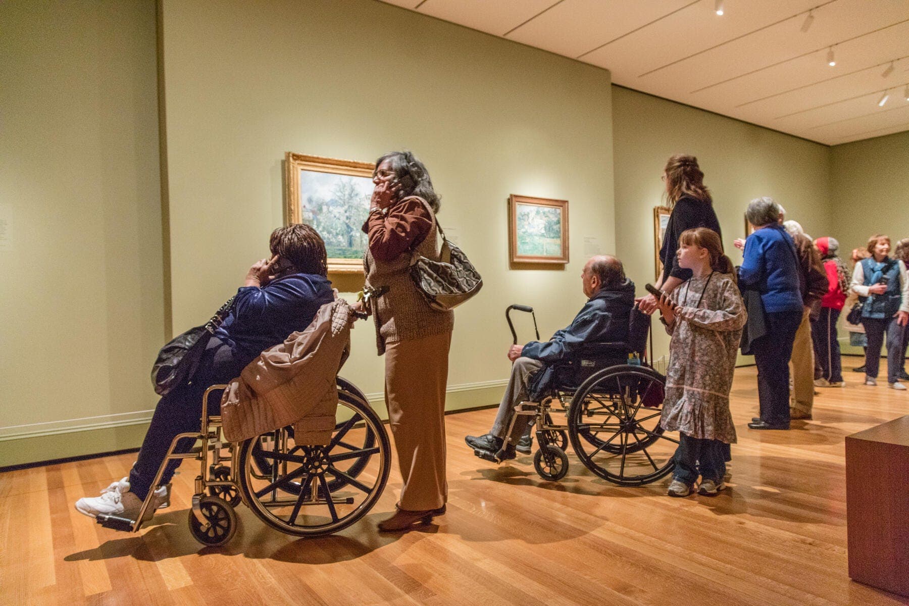a group of people in a museum