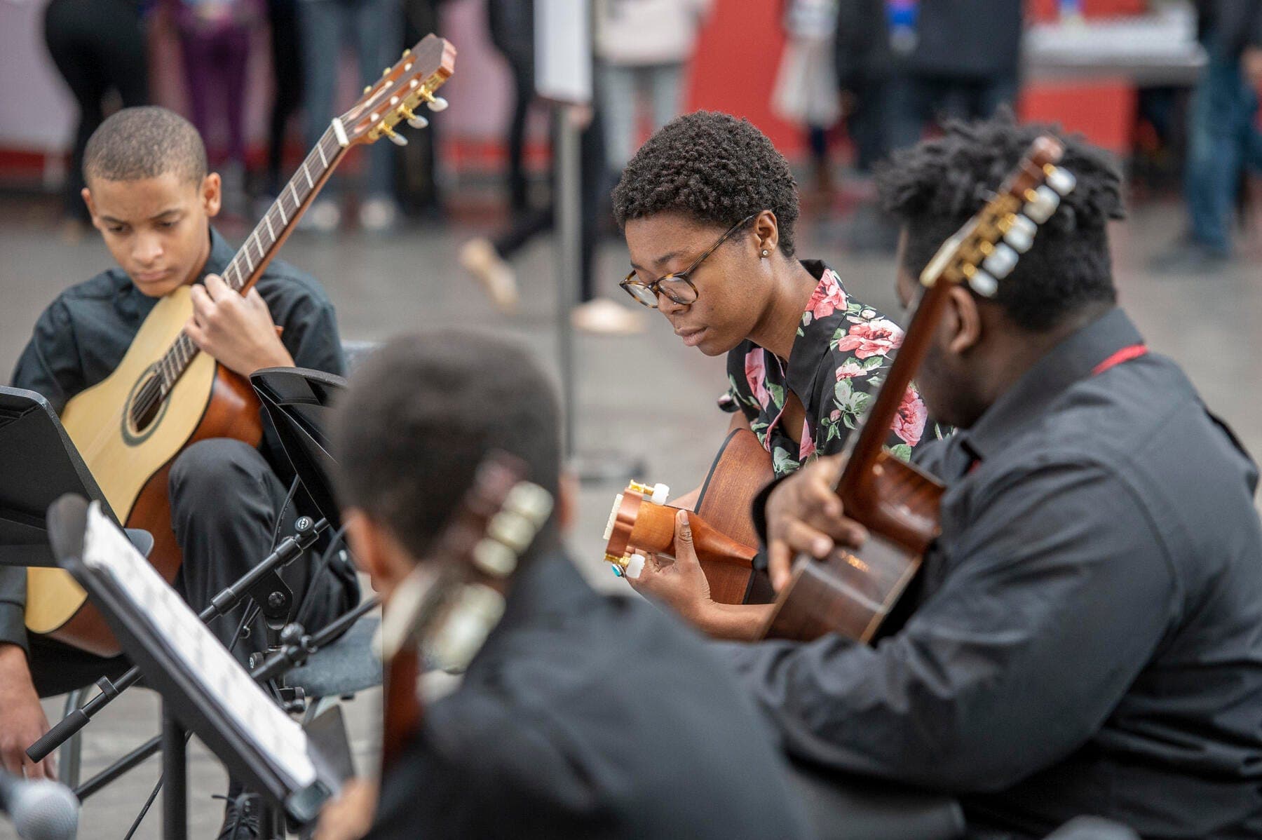 a group of people playing instruments