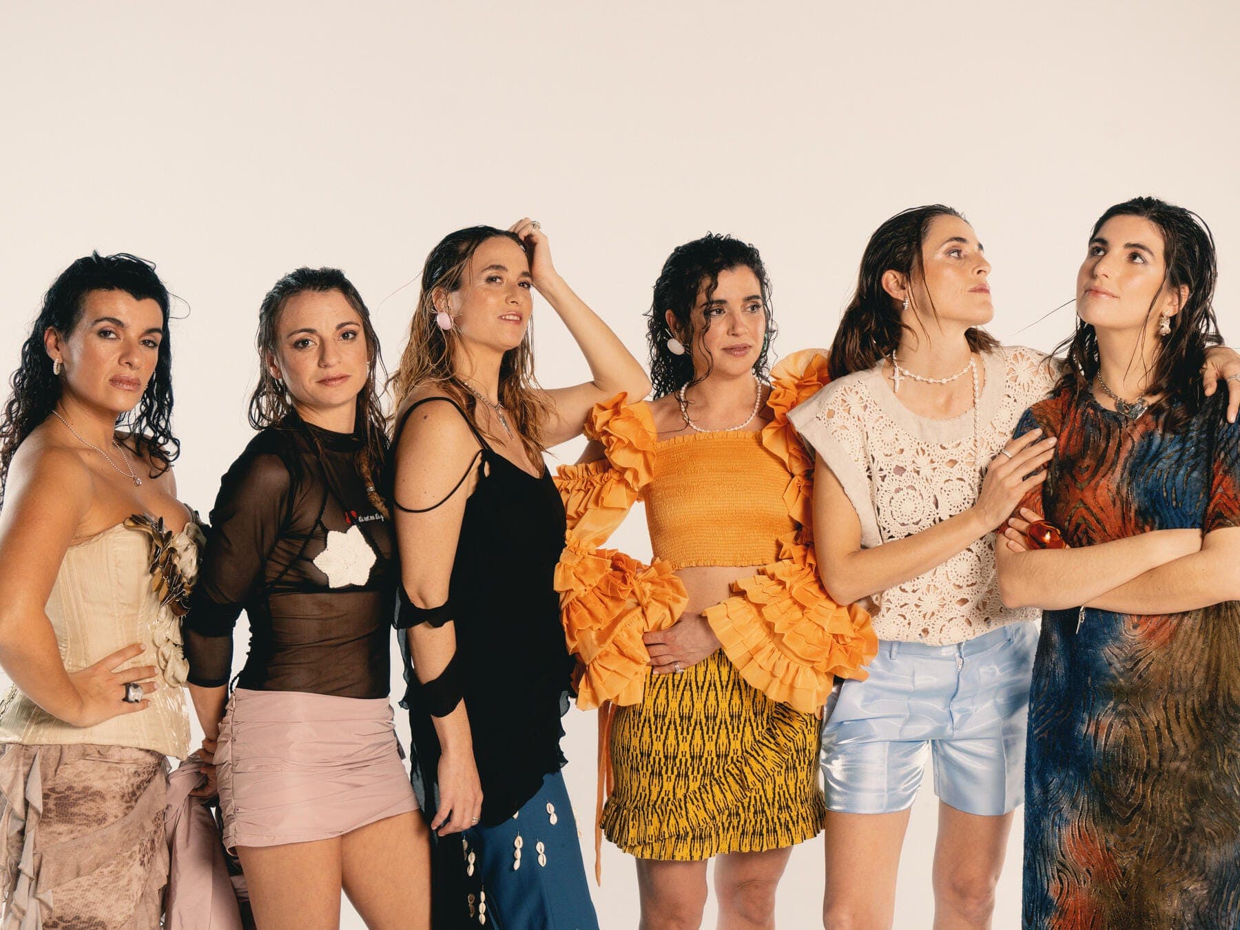a group of women posing for a photo