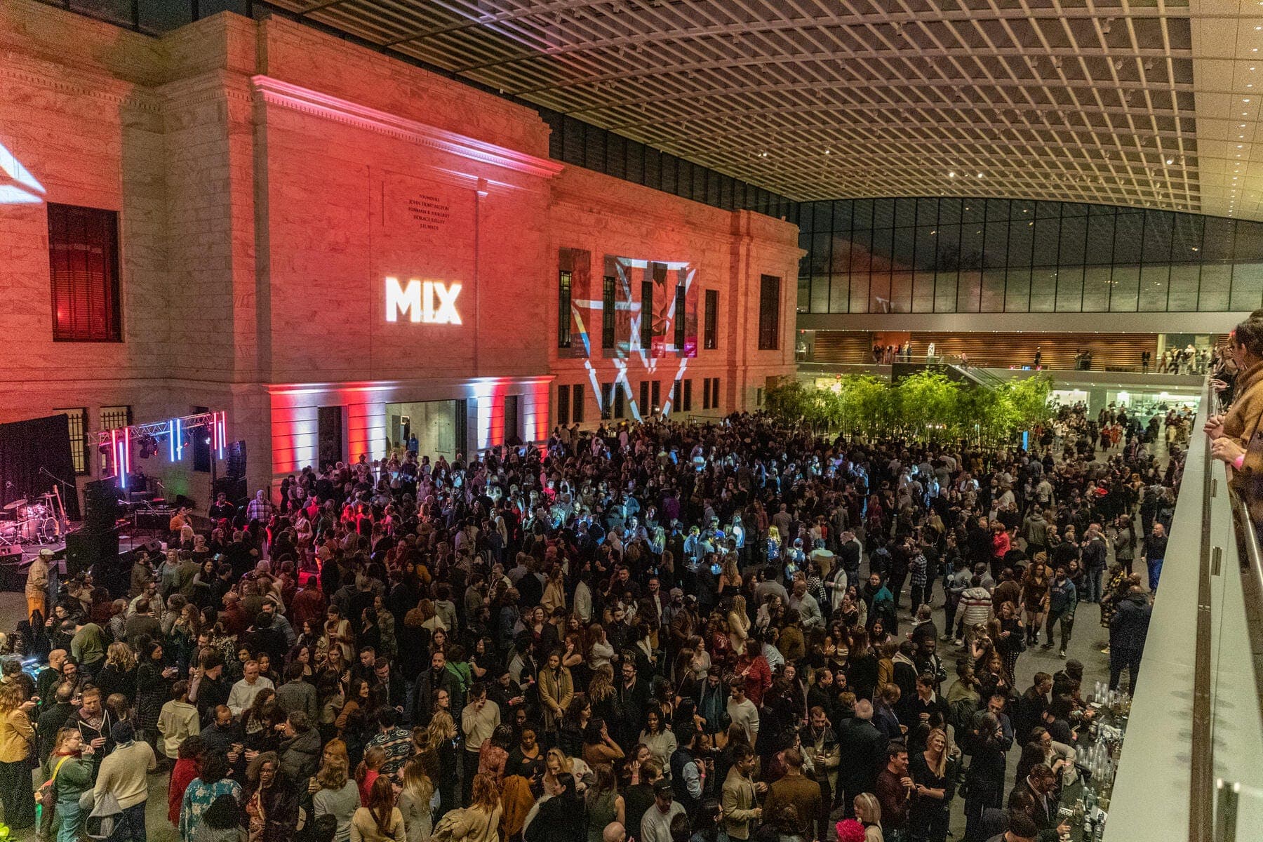 a large crowd of people in a building