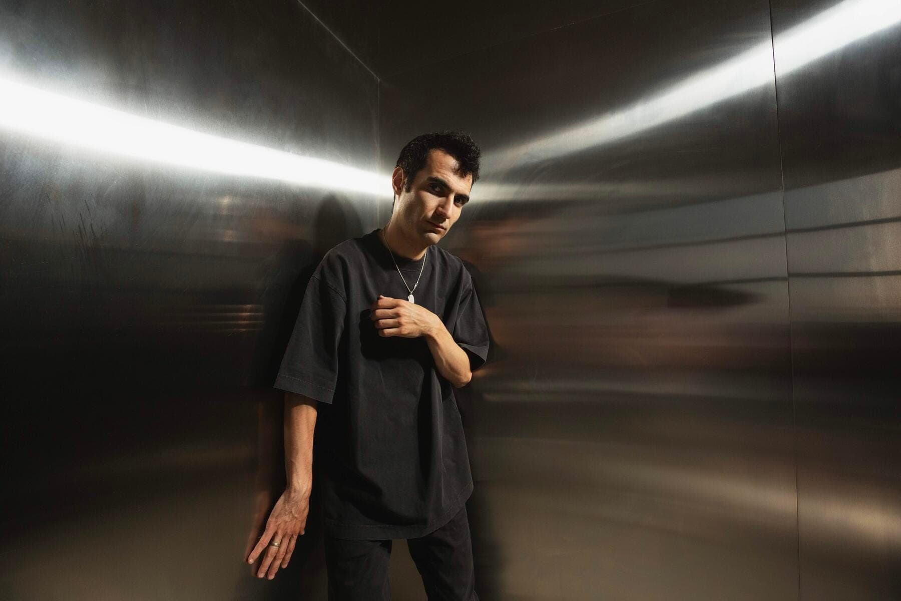 a man standing in a dark room