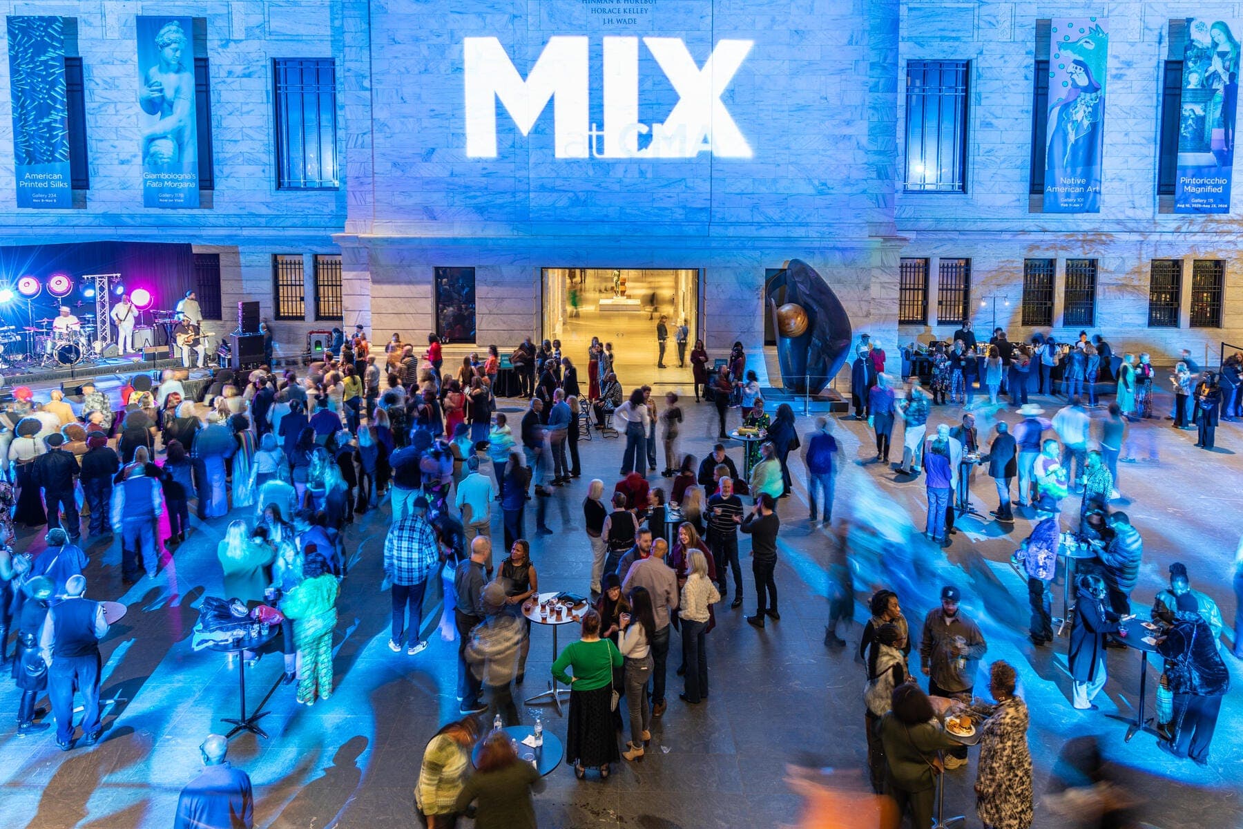 a large crowd of people outside a building