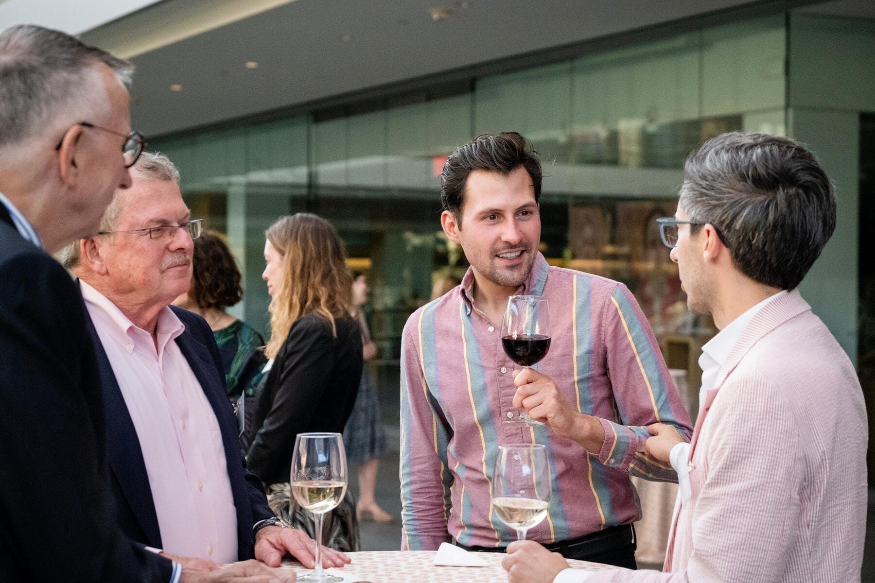 a group of people having a conversation