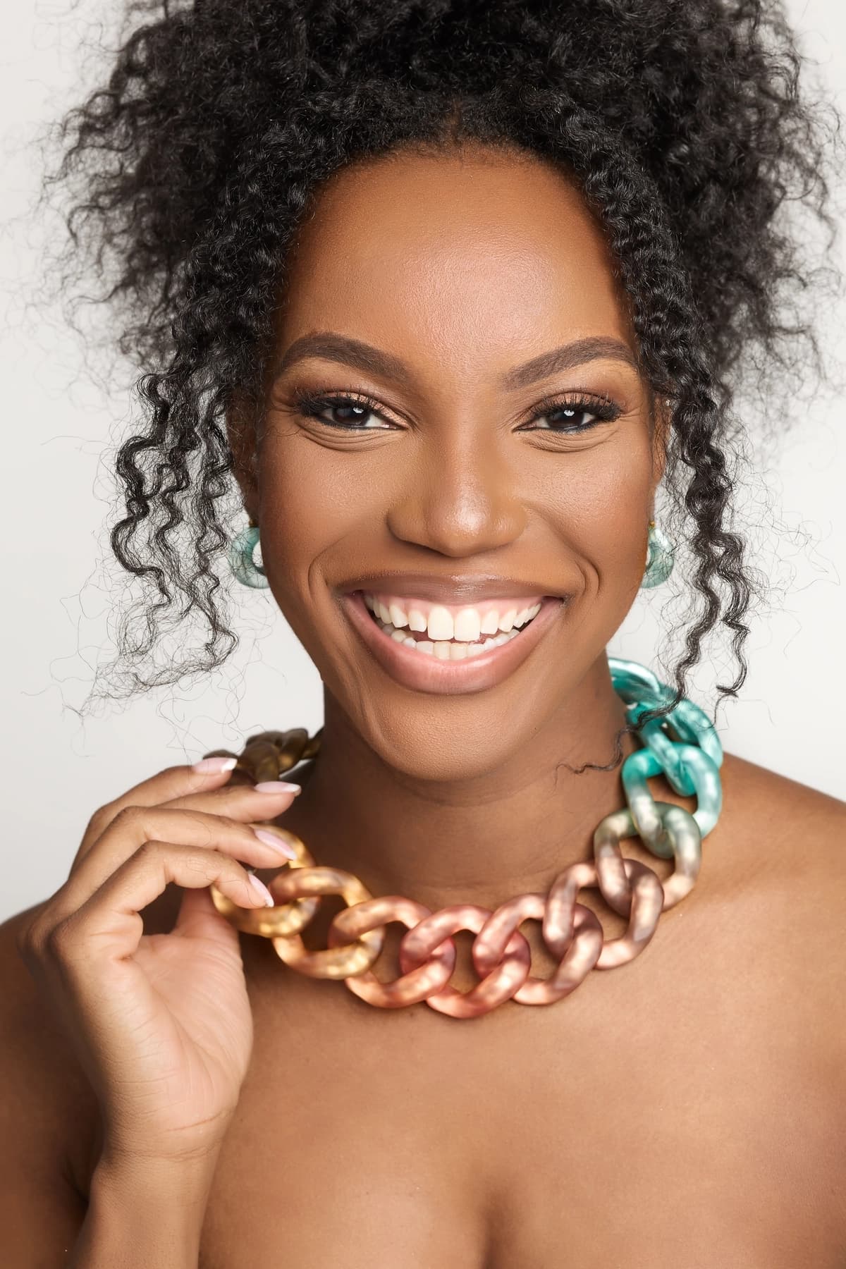 a person holding a lizard