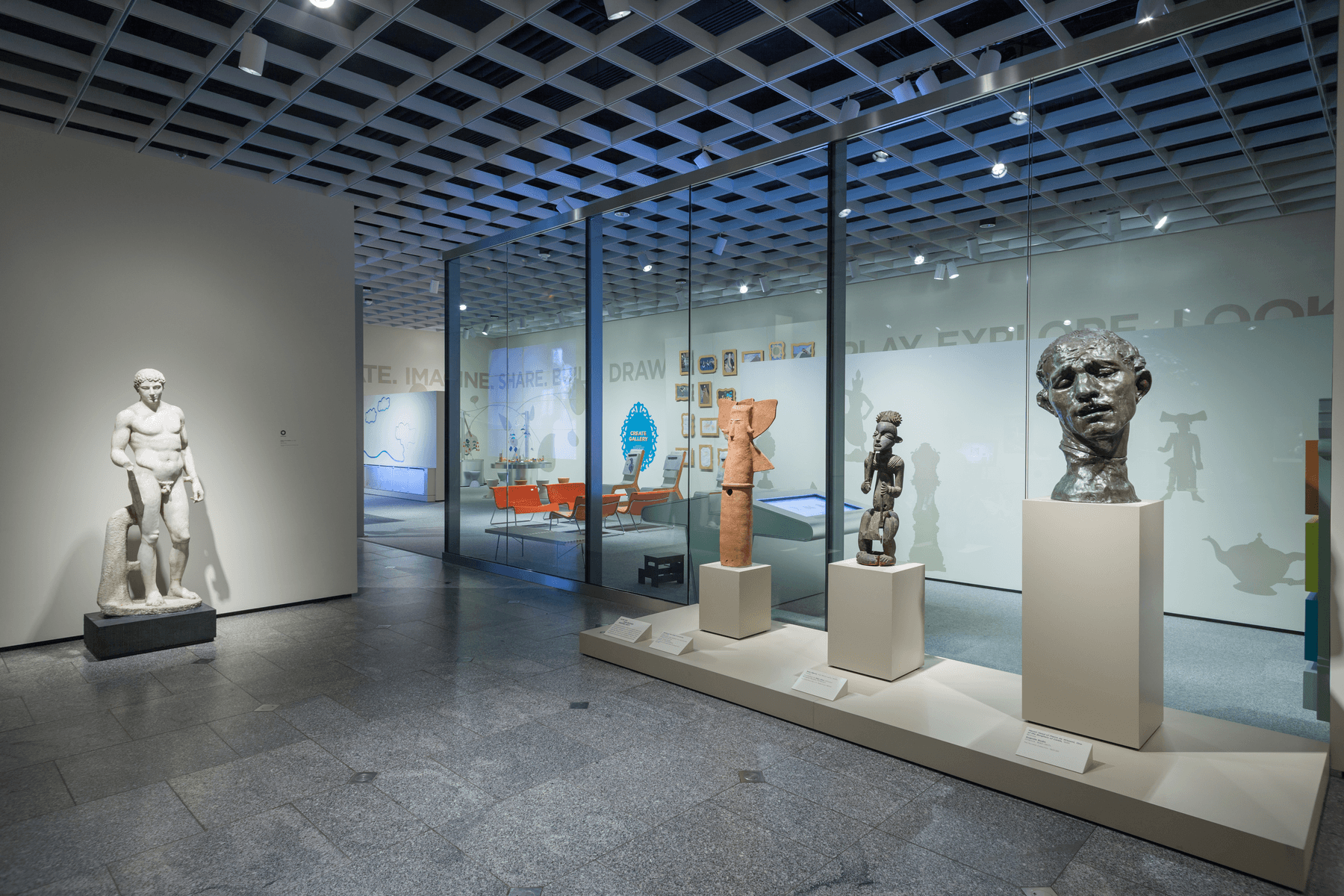 a museum with several statues