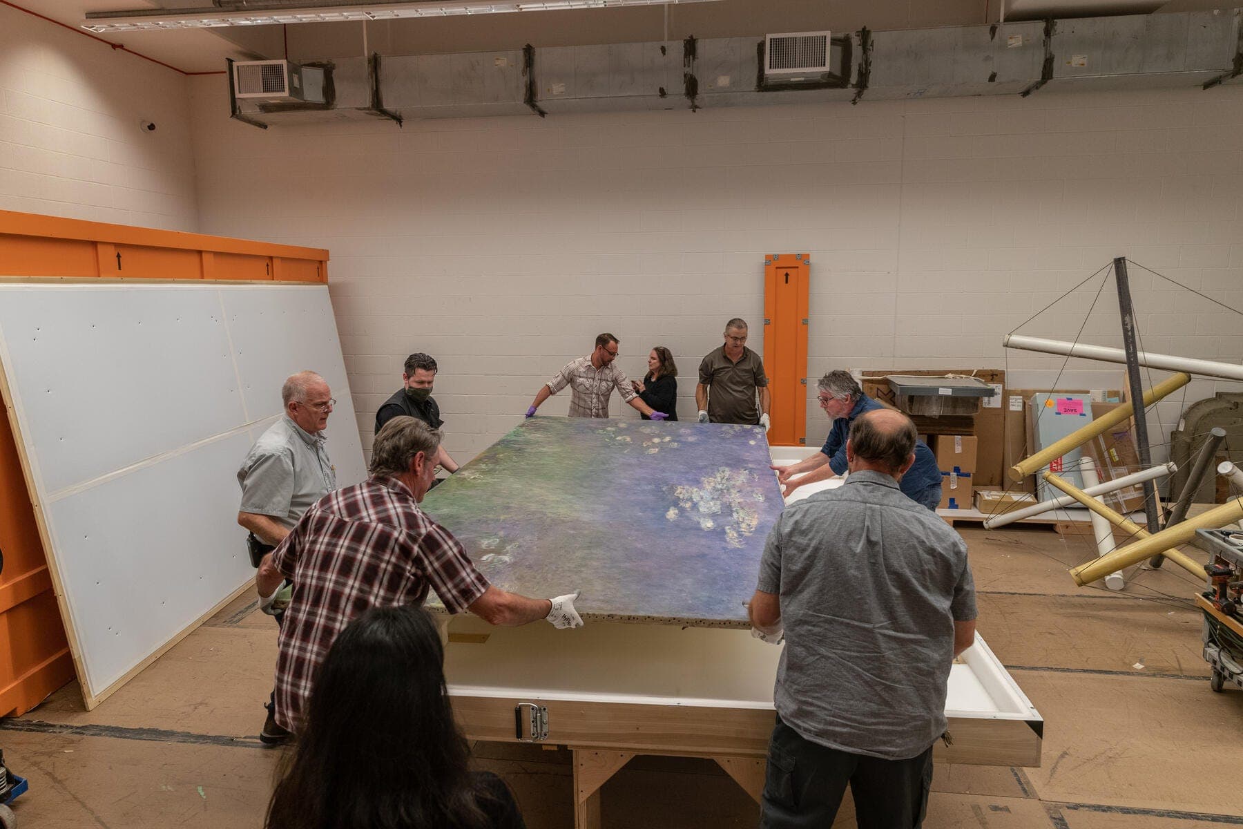 a group of people painting