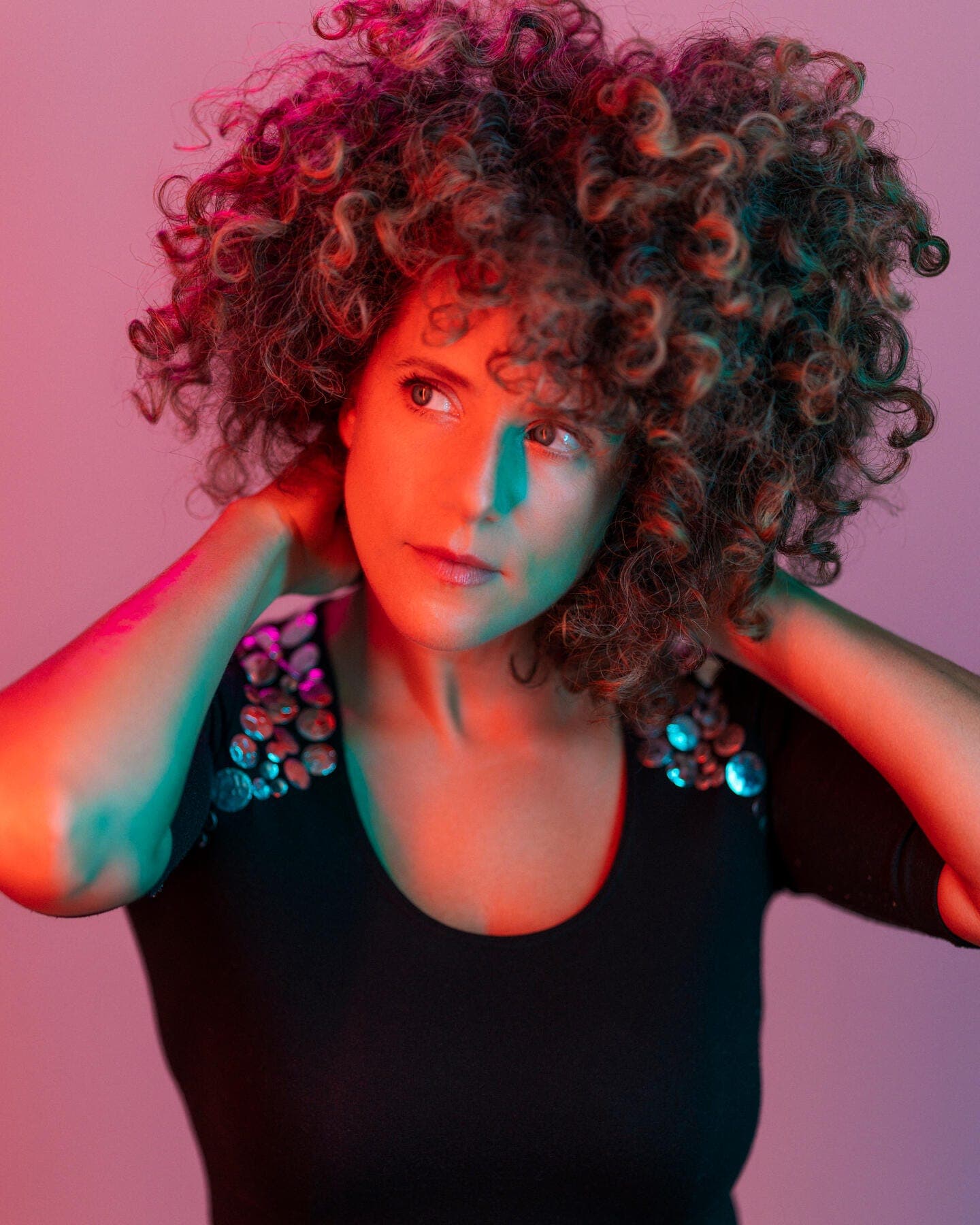 a woman with colorful hair