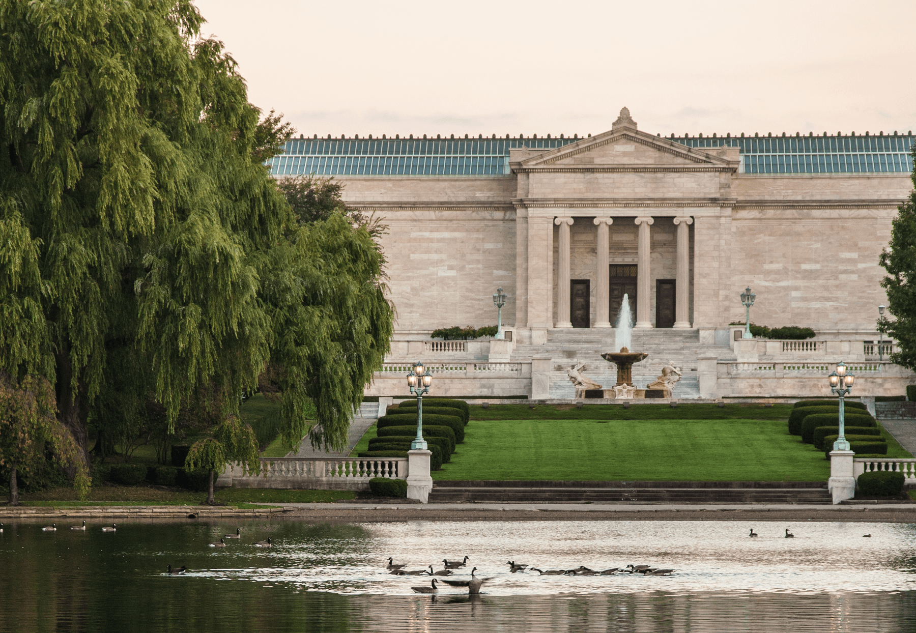 a building with a fountain in front of it