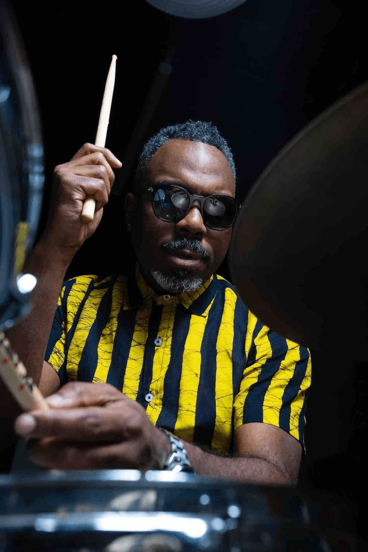 a man holding a cigarette