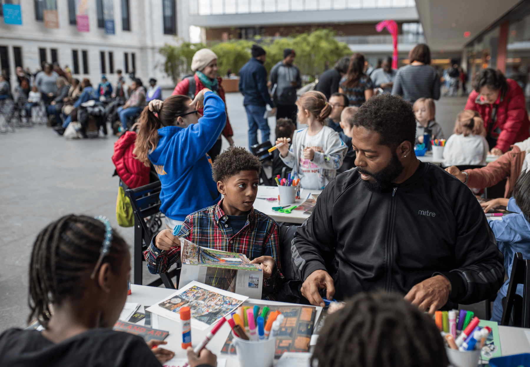 a group of people sitting at a table