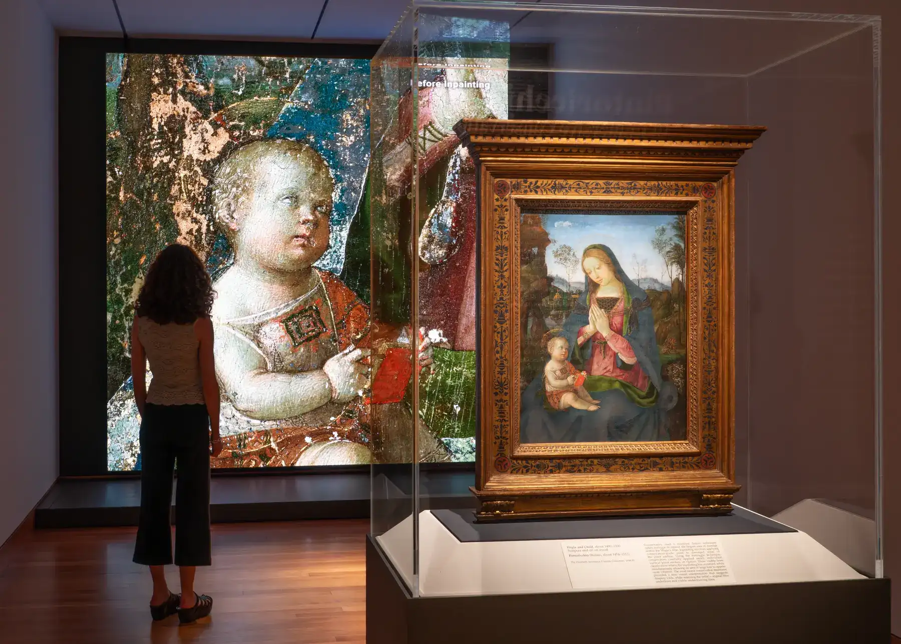 a person painting on a easel