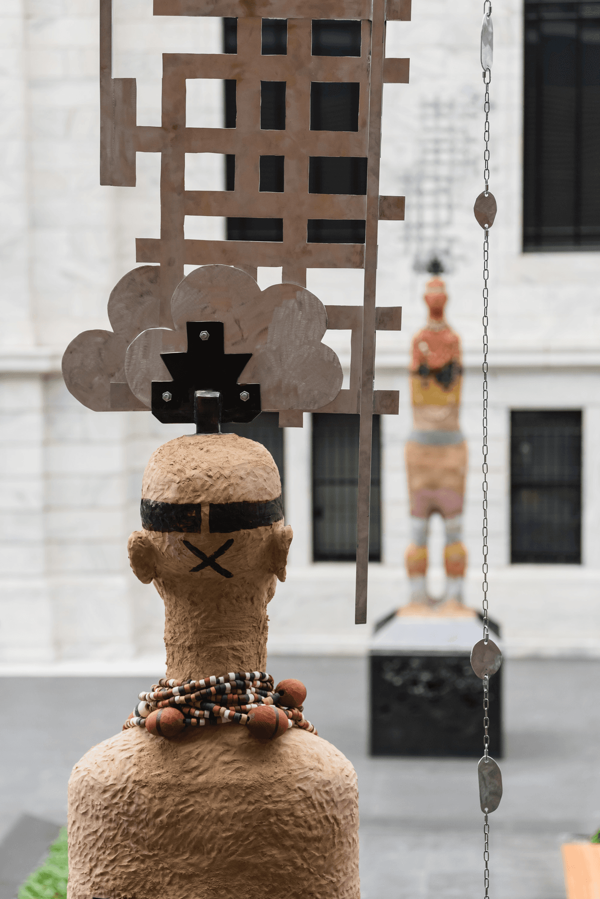 a snowman with a cross on it