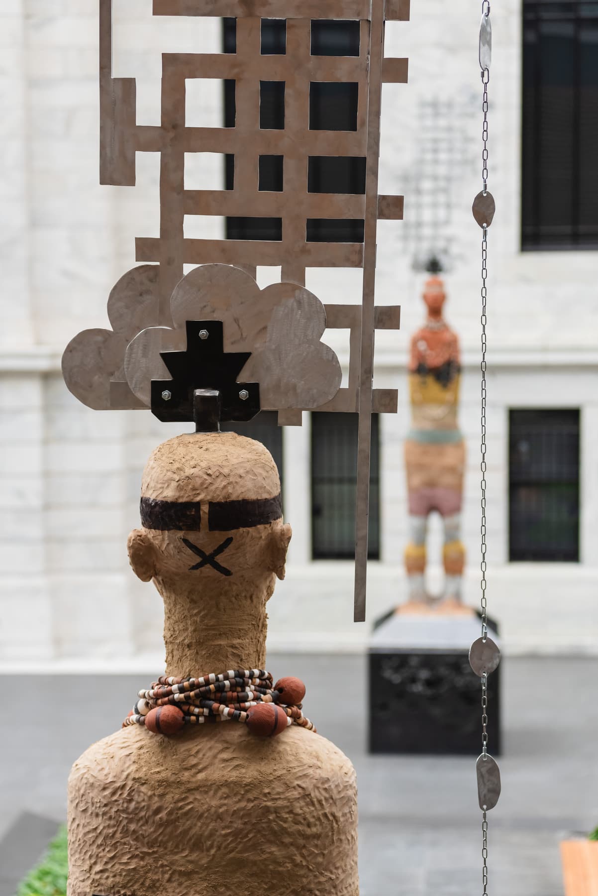 a snowman with a cross on it