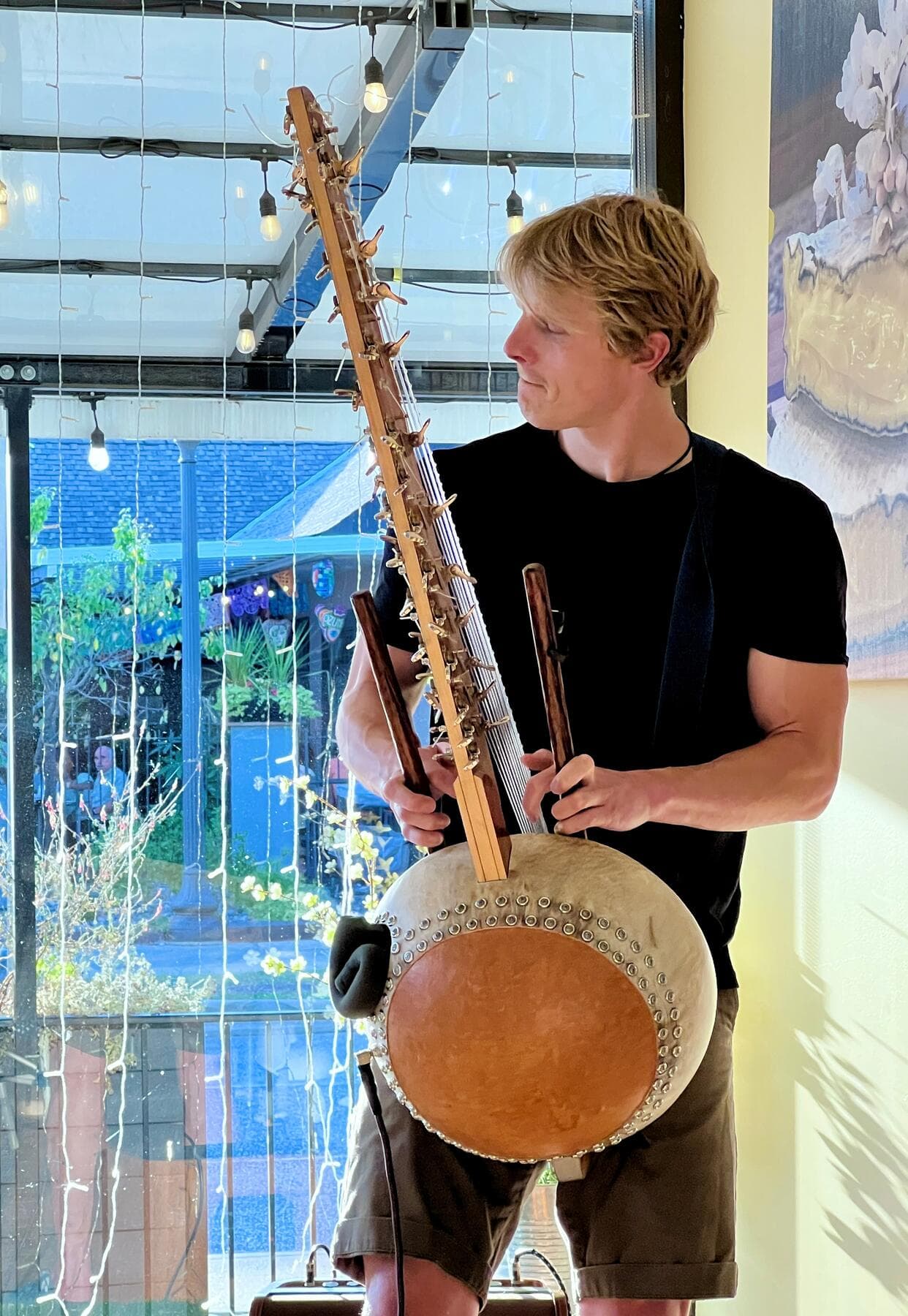 a person playing a cello