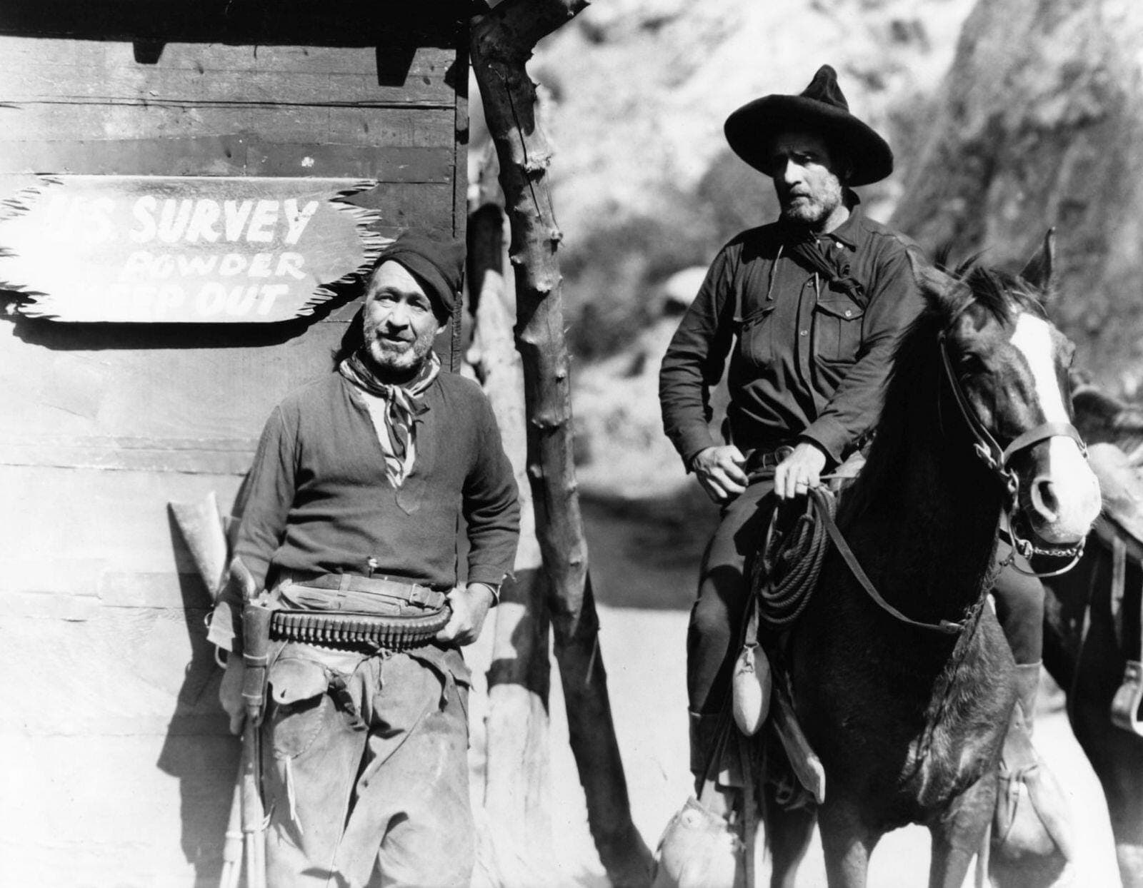 J. Farrell MacDonald, Tom Santschi standing next to a horse