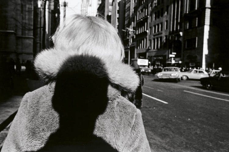 At a time when the prevailing style was for the photographer’s presence to be invisible, Friedlander began to insert himself, often with irony and playfulness, into the composition via cast shadows or reflections (New York City, 1966; gelatin silver print