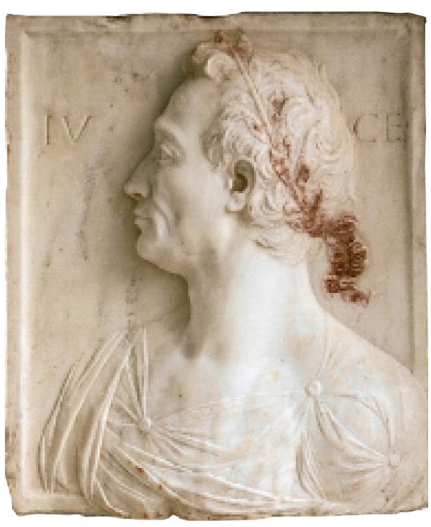 Mino da Fiesole (Italian, c. 1429–1484). Julius Caesar, c. 1455–60. Marble with traces of bole and gilding, mounted with mortar into limestone with traces of polychromy
