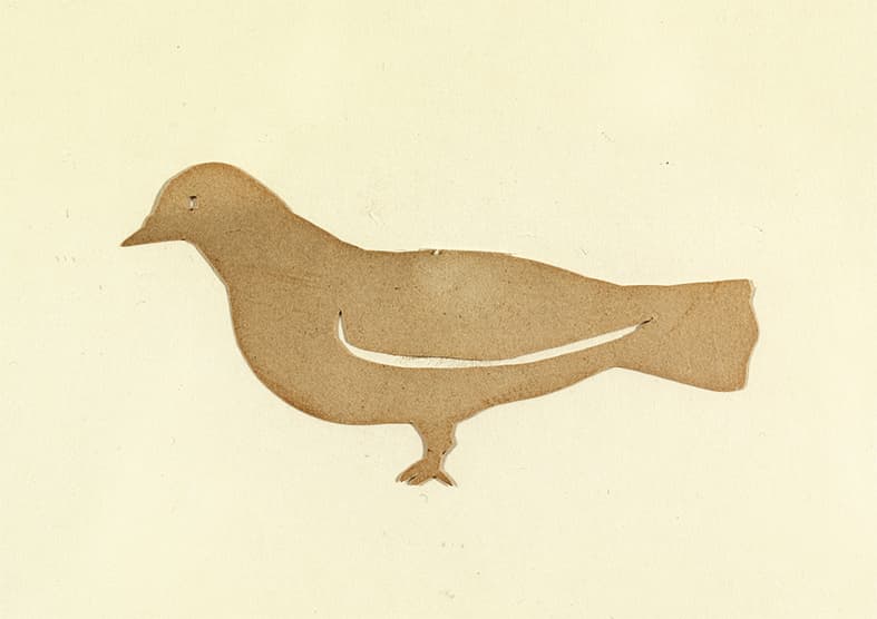 A light brown cut out of a bird.