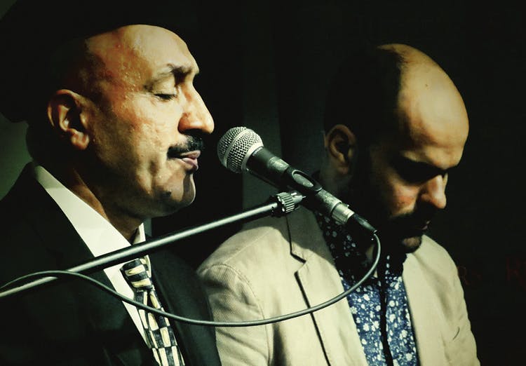 Celebrating the Maqam Singer Hamid Al-Saadi (left) performs with the author. 