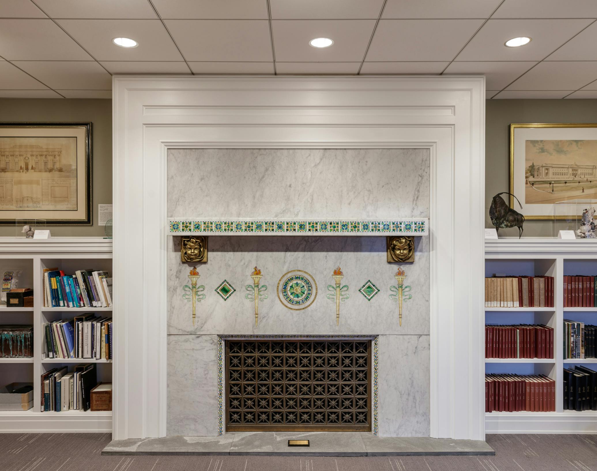 The Museum Archives with Tiffany fireplace in foreground and bookshelves to each side