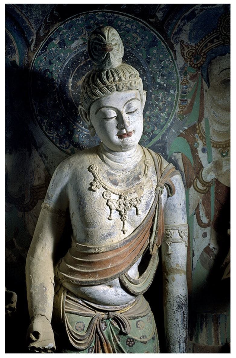 A sculpture of Bodhisattva in a cave 