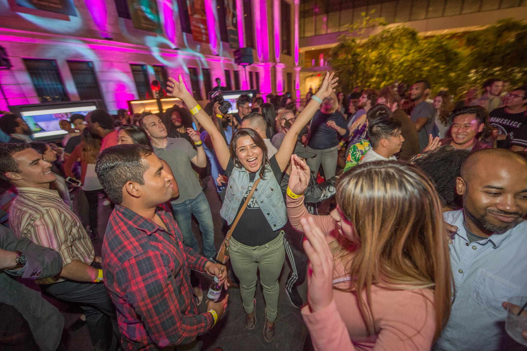 Visitors dancing in the museum's atrium