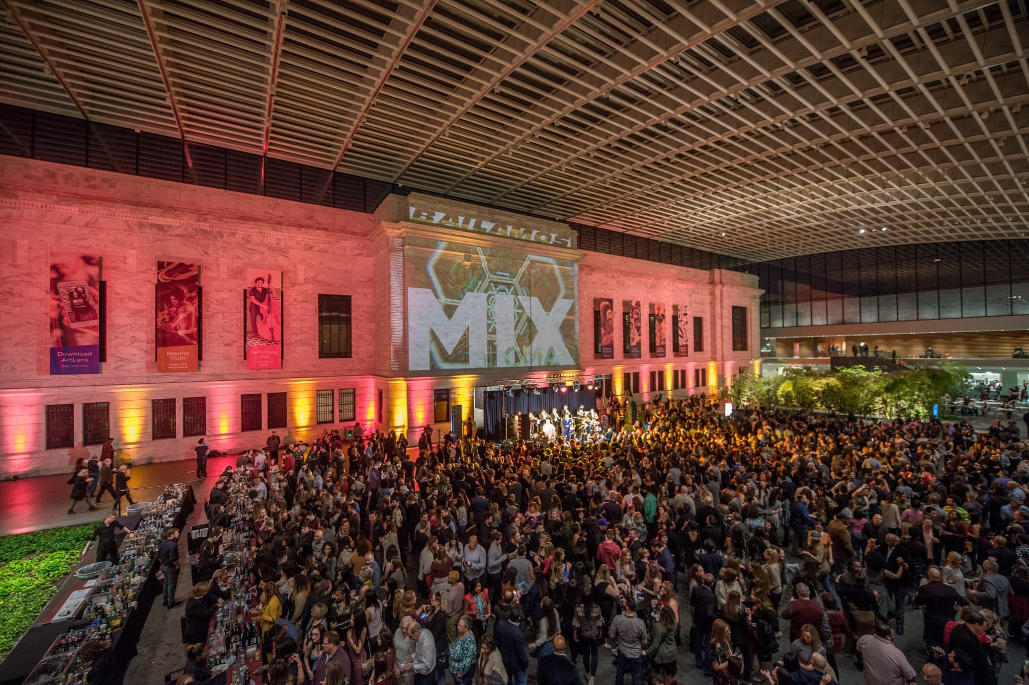 Museum atrium with people dancing