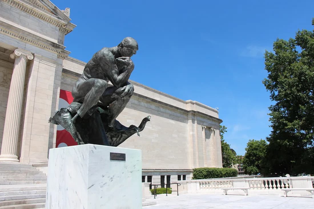 Cleveland Museum of Art edifice with The Thinker sculpture.