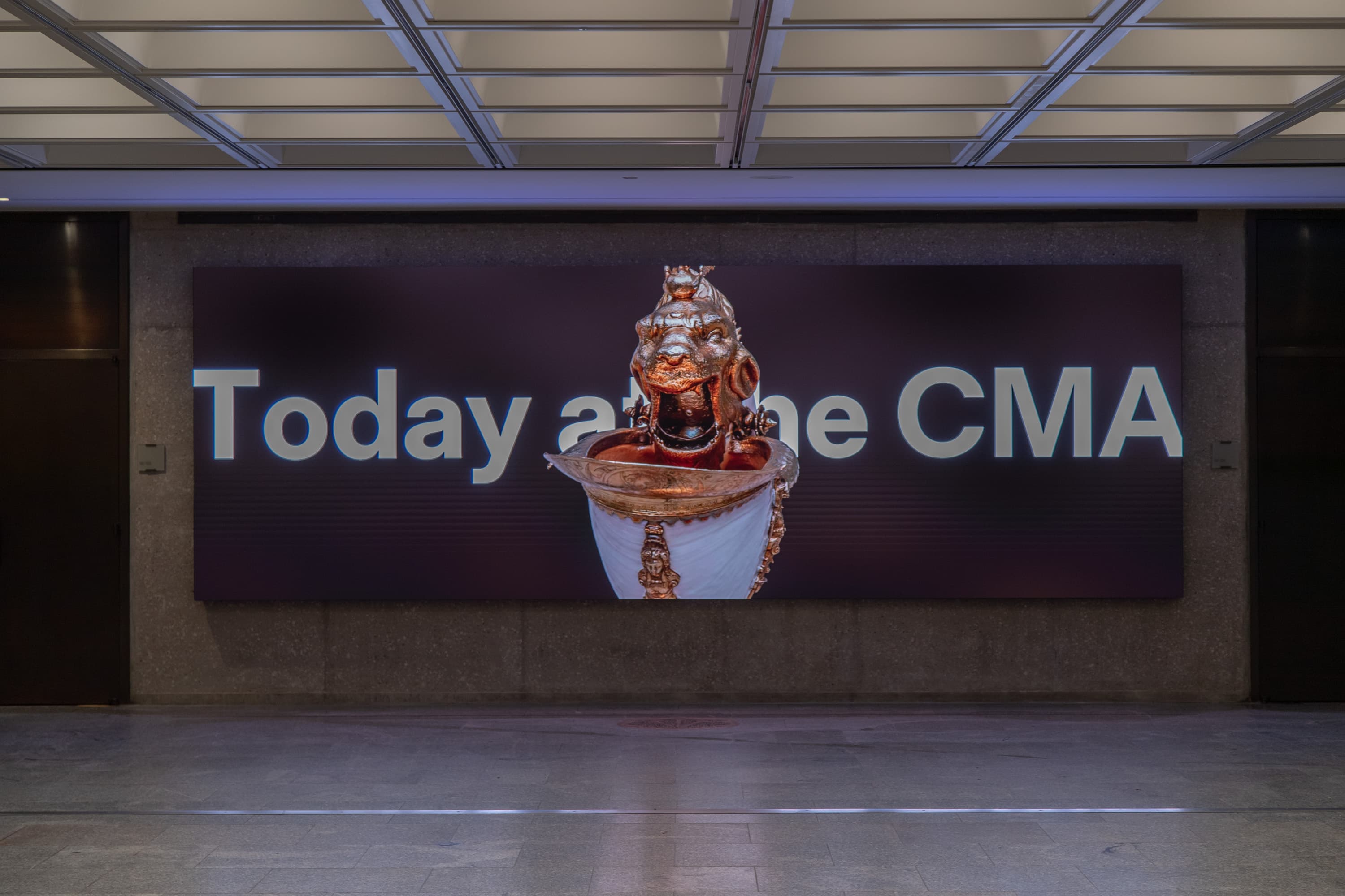 Digital signage in the museum lobby reads "Today at the CMA"