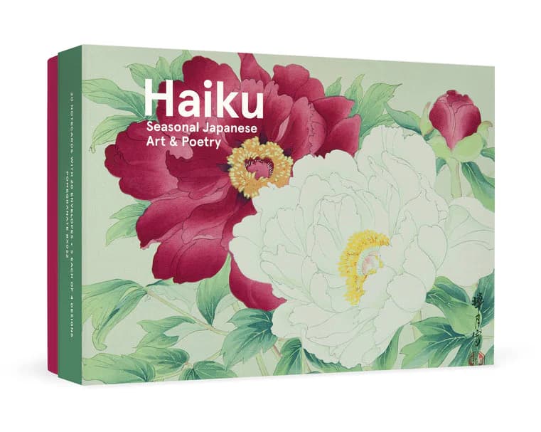 A notecard box with drawings of flowers and text on the box reading "Haiku: Seasonal Japanese Art & Poetry"