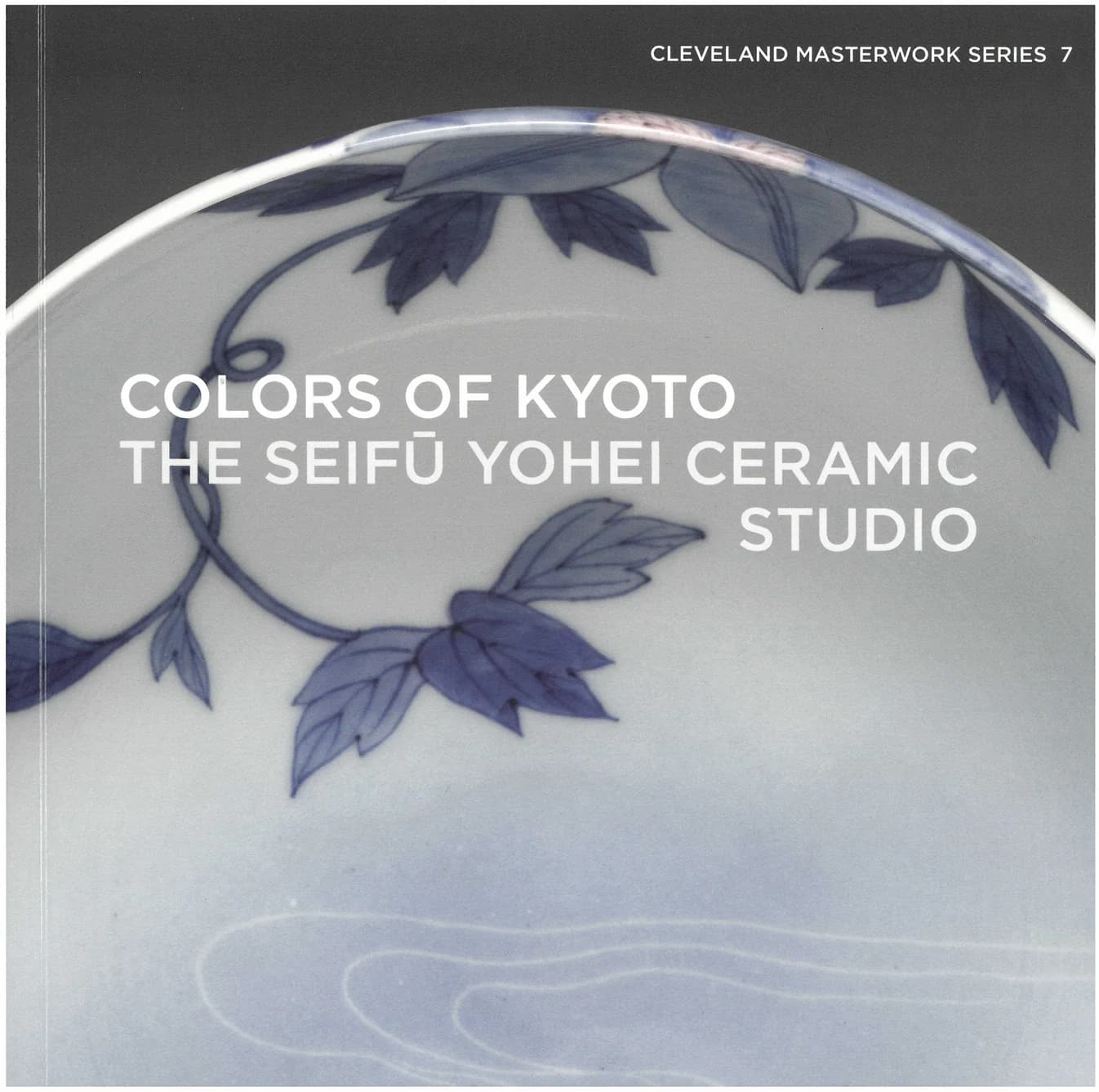 A book cover featuring an image of a white ceramic with blue floral designs. The title reads "Colors of Kyoto: The Seifū Yohei Ceramic Studio"