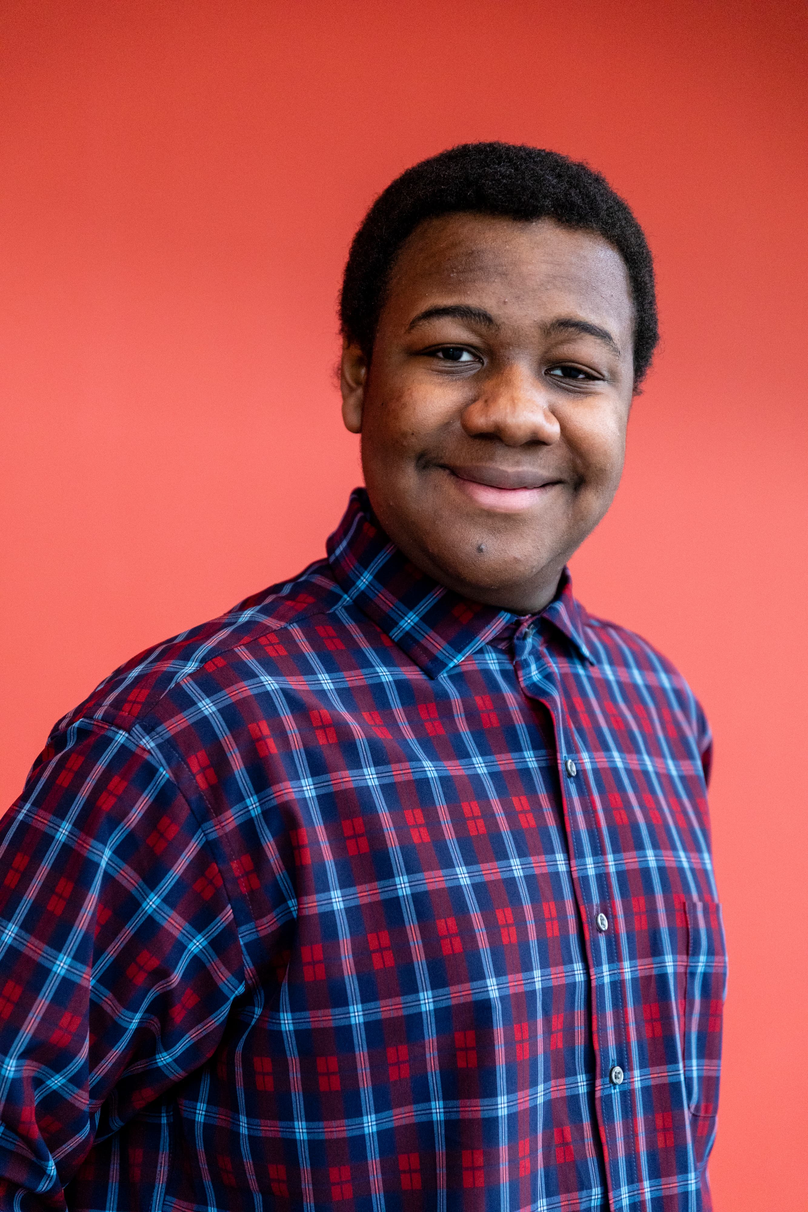 Photo of a young man with a flannel