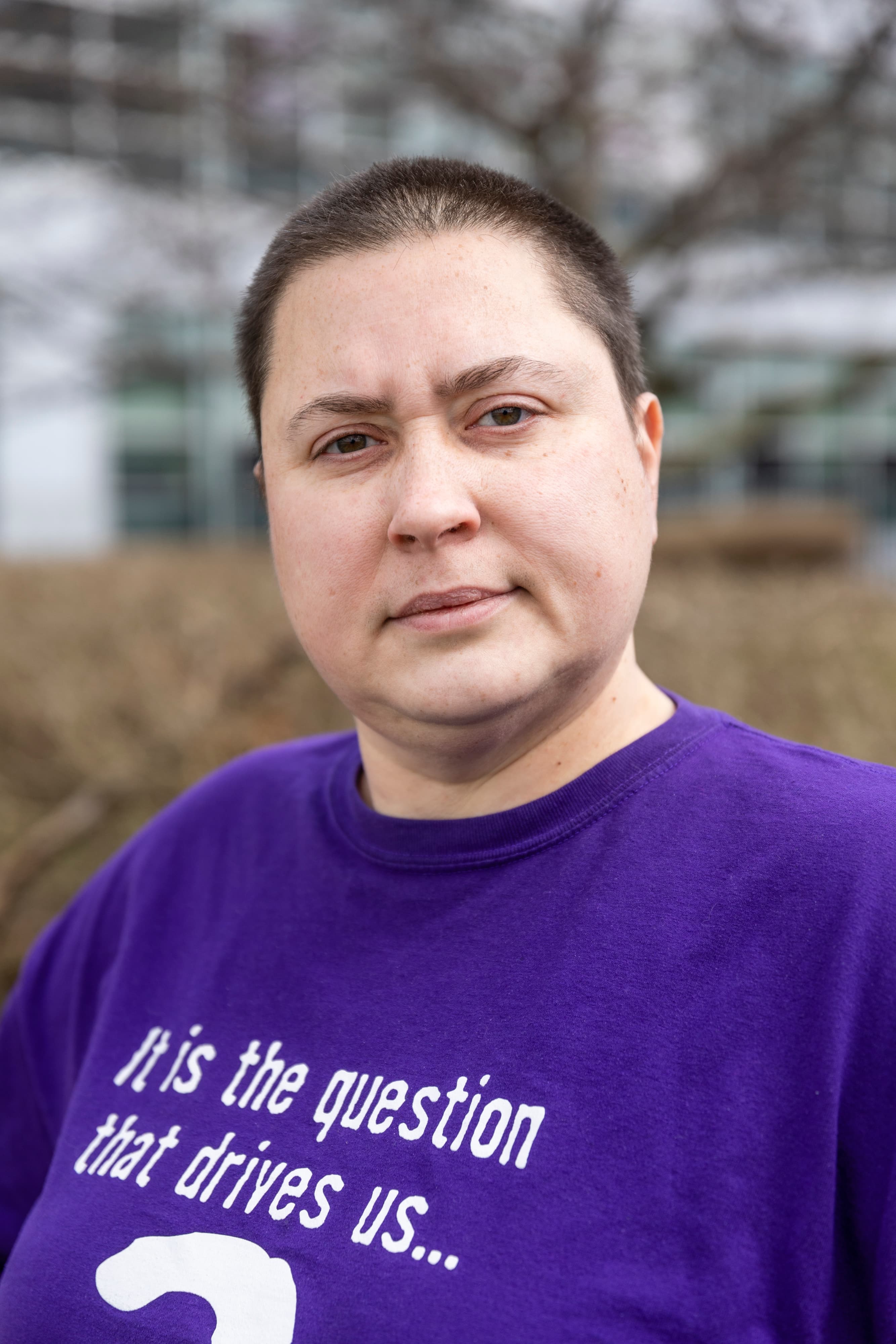 Portrait of a woman in a purple t-shirt