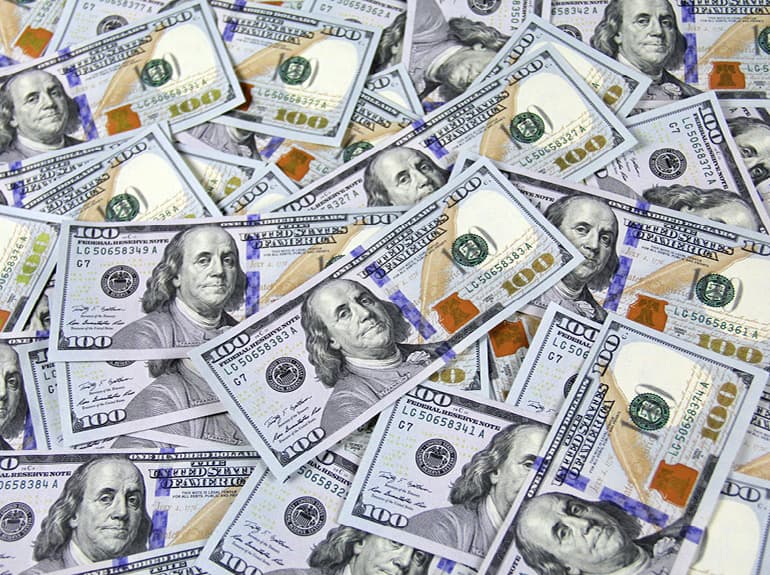 A pile of $100 bills