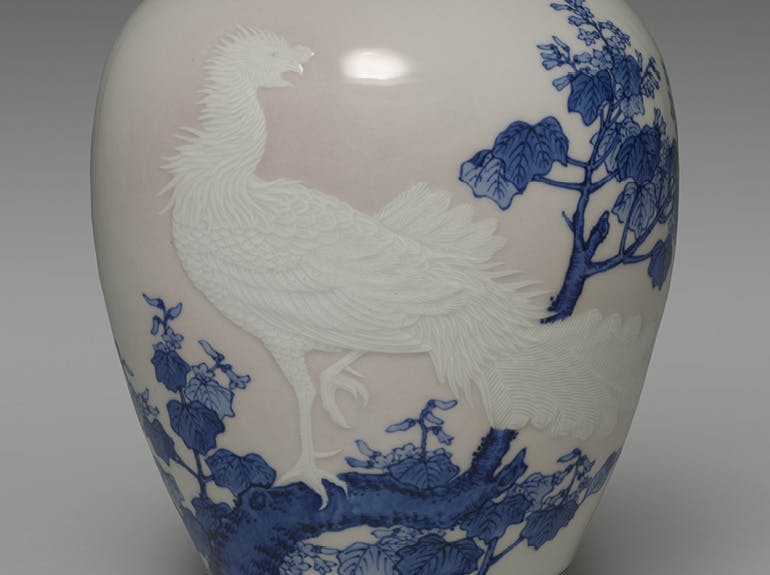 blue and white ceramic vase with phoenix