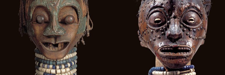 Male figure (detail). Songye, D.R.C. Wood, horn, metal, beads, fiber, pelts, snake skin; h. 90.5 cm. Ethnographic Museum, Antwerp [Bequest of Paul Osterrieth, 1940] (AE 1940.1.47). Male figure (detail). Songye, D.R.C. Wood, metal, cowries, horns, pelts, pangolin skin, beads; h. 121.3 cm. Private collection. Photo: © Ethnographic Museum, Antwerp Michel Wuyts