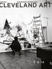Black and white photo of Kara Walker in her studio painting