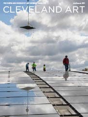 Cover: construction workers Installing the atrium roof Glass panels are lifted into place